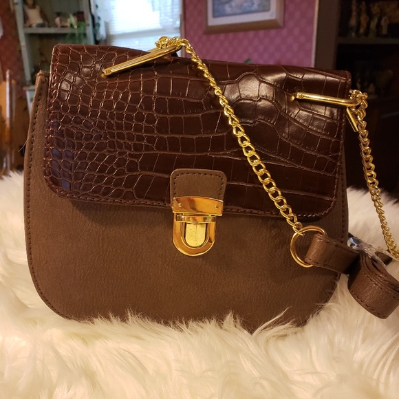 Handbags - NWOT brown cross body purse.